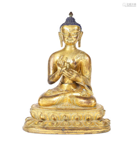 A Gilt-Bronze Figure Of Buddha