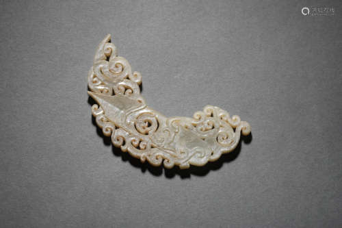 A Jade Reticulated ‘Huang’ Ornament