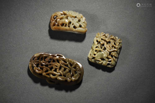 A Group Of Reticulated Jade Ornaments