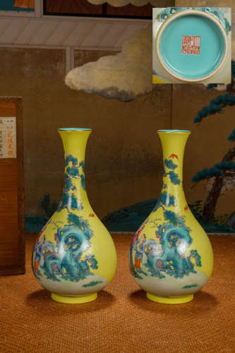 A pair of yellow bottles depicting character stories Chinese...