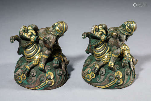 A Pair of Bronze and Silver Inlaid Elephants