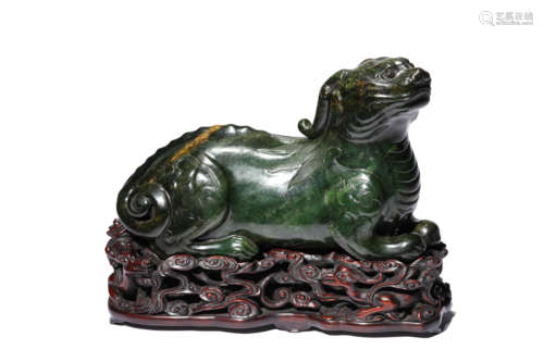 A Spinach-Green Jade Beast Carving