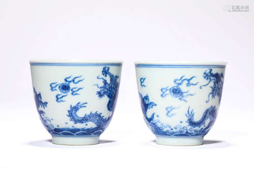 A Pair of Porcelain Blue and White Dragon and Sea Cups