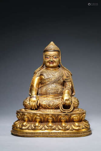 A Tibetan Bronze Guru Statue