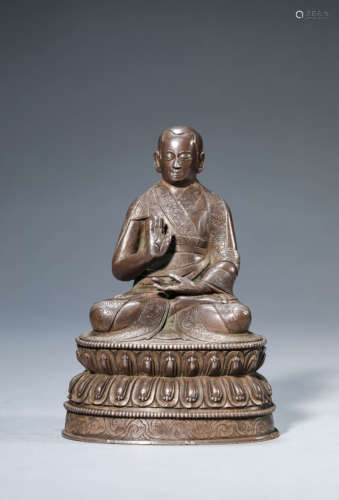 A Silver Guru Statue