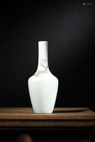 A WHITE-GLAZED 'DRAGON' BOTTLE VASE, KANGXI MARK