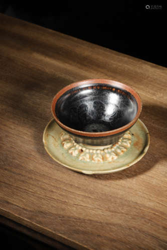 AN EXQUISITE 'JIAN' BLACK-GLAZED BOWL WITH CELADON-GLAZED ST...