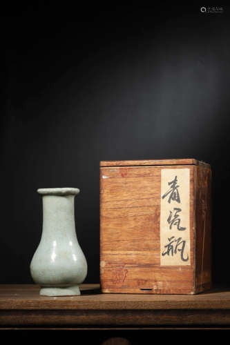 A CELADON GLAZED BOTTLE VASE