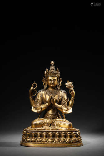 A Gilt-Bronze Four-Armed Avalokitesvara