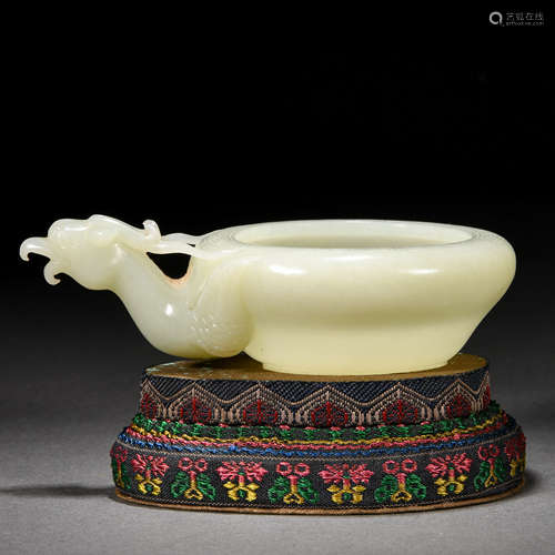 A Carved White Jade Washer