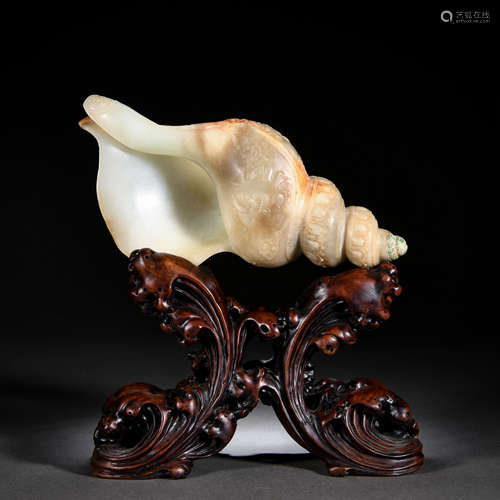 A Chinese Carved White Jade Conch