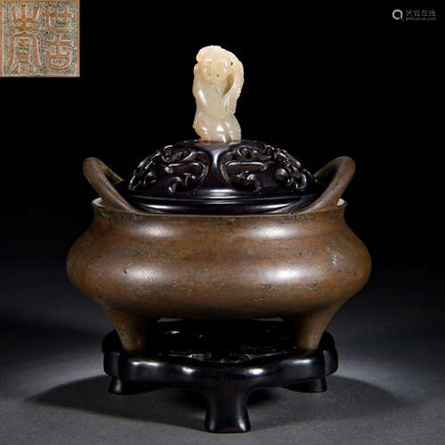 A Chinese Bronze Tripod Censer