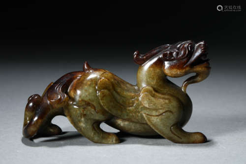 A Chinese Carved Jade Mythical Beast