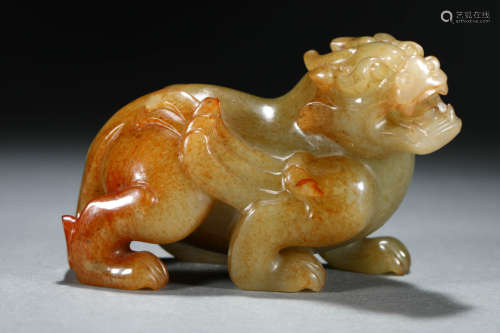 A Chinese Carved Jade Mythical Beast