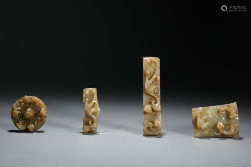 A Set of Four Chinese Carved Jade Sword Fittings