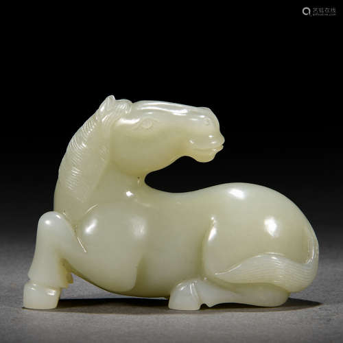 A Chinese Carved White Jade Horse