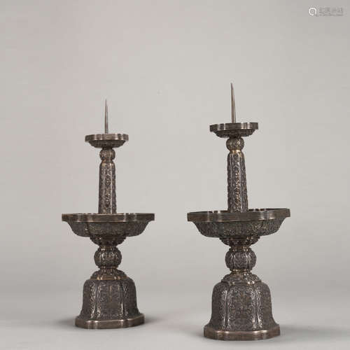 Pair of Silver Carved Flower Pattern Candlesticks