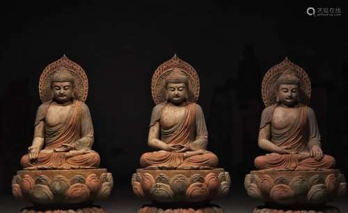 Group of Three Colored Wood Buddha Figure