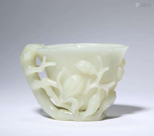 A CARVED JADE MAGNOLIA HORN CUP