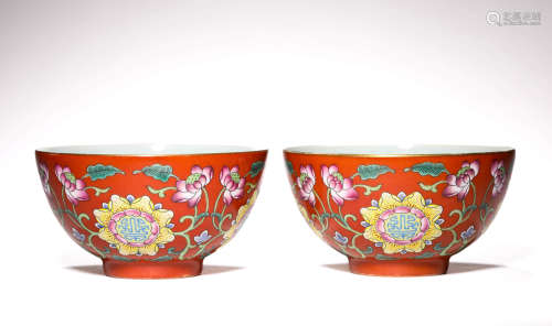 A PAIR OF CORAL-RED-GROUND FLORAL BOWLS