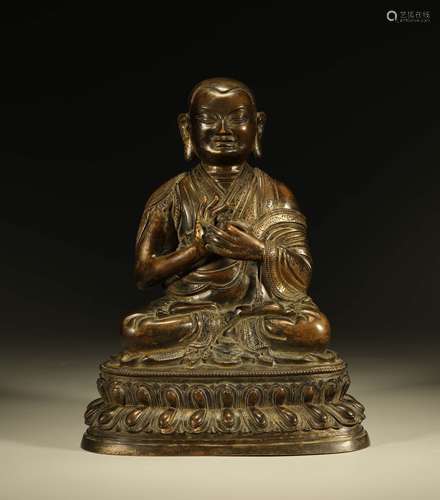 A COPPER STATUE OF GURU