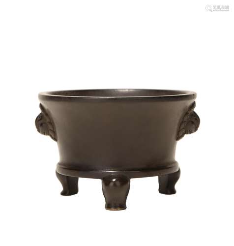 A BRONZE TRIPOD CENSER