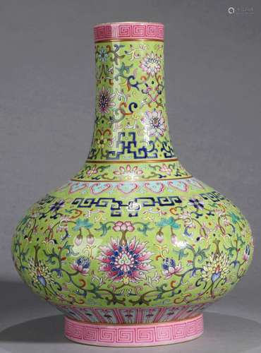 A GREEN-GROUND FAMILLE ROSE BOTTLE VASE