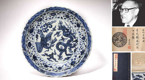A BLUE AND WHITE DRAGON AND PHOENIX PLATE