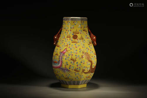 A YELLOW-GROUND FAMILLE ROSE DRAGON AND PHOENIX VASE