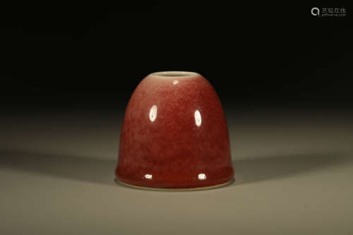 A RED-GLAZED WATER POT