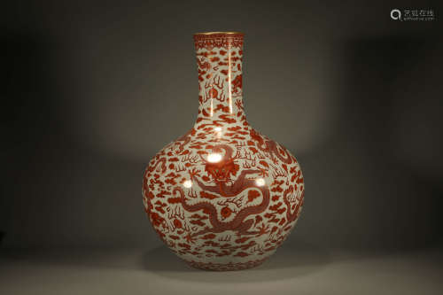 AN IRON-RED GILT-DECORATED DRAGON VASE, TIANQIUPING