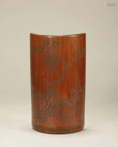 A CARVED BAMBOO ARM REST