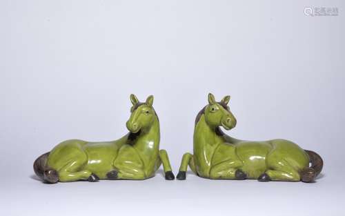 A PAIR OF GREEN-GLAZED HORSES