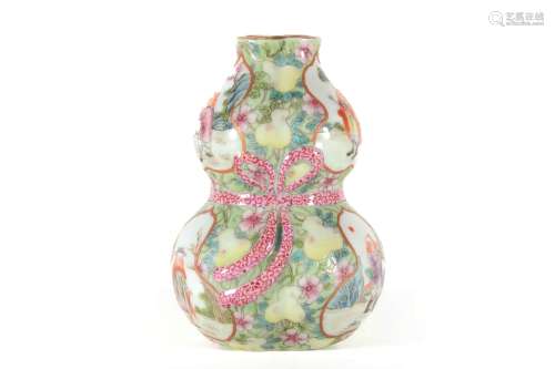 A FAMILLE ROSE FIGURE STORY FLOWER RECEPTACLE