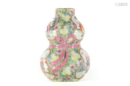 A FAMILLE ROSE FIGURE STORY FLOWER RECEPTACLE