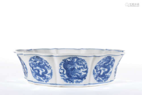 A BLUE AND WHITE DRAGON FLORIFORM WASHER