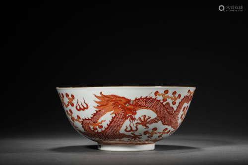AN IRON RED DOUBLE DRAGON CHASING FLAMING PEARL BOWL, GUANGX...