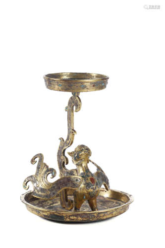 AN INLAID GILT-BRONZE CANDLESTICK