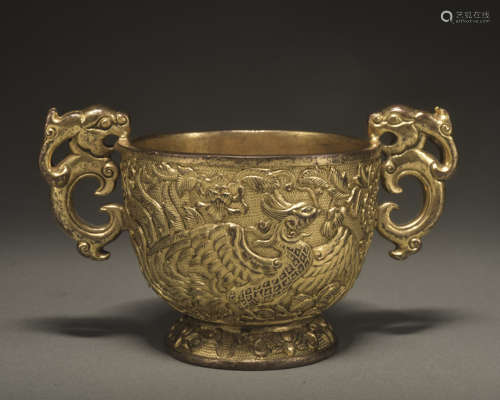 A GILT-BRONZE CUP