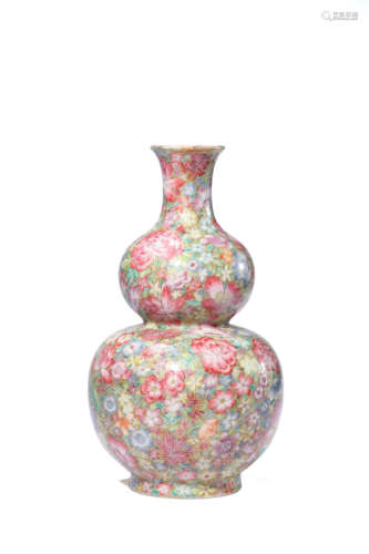 A FAMILLE ROSE MILLEFLEURS DOUBLE-GOURD-SHAPE VASE