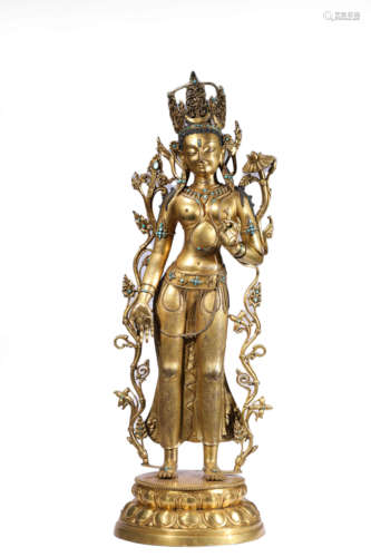 A GILT-BRONZE STATUE OF GREEN TARA