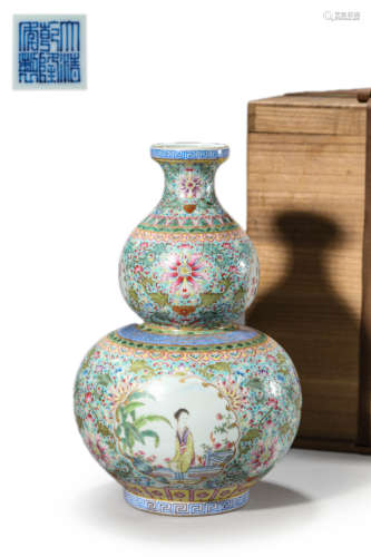 FAMILLE ROSE LANDSCAPE AND FIGURE GOURD-SHAPE VASE, QIANLONG...