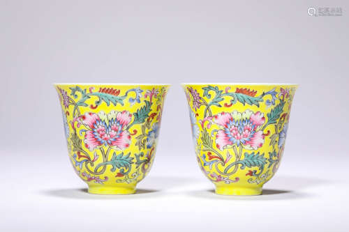 A PAIR OF LEMON YELLOW GROUND FAMILLE ROSE INTERTWINED FLORA...