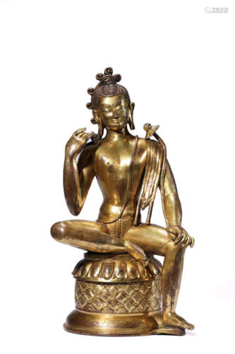 A GILT-BRONZE STATUE OF AVALOKITESVARA