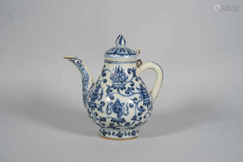 A BLUE AND WHITE EIGHT TREASURES EWER