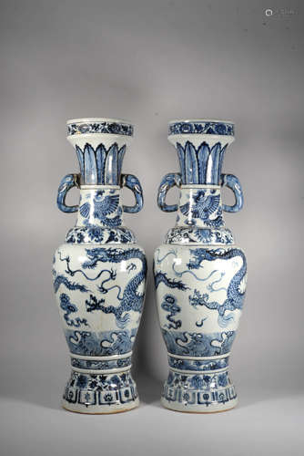 A PAIR OF BLUE AND WHITE DRAGON VASES