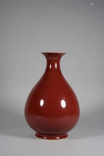 A RED-GLAZED PEAR-SHAPED VASE