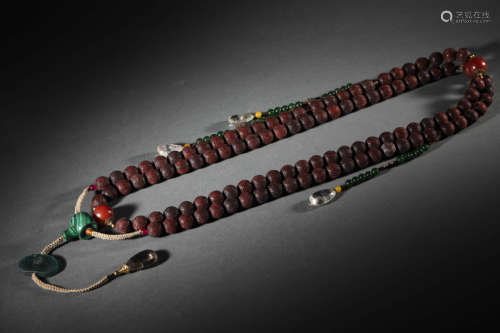 A SET OF WOOD BEADS, CHAOZHU