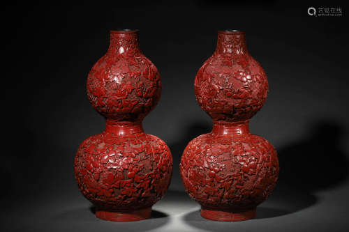 A PAIR OF CINNABAR LACQUER DOUBLE-GOURD VASES