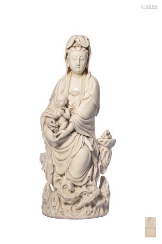 A DEHUA FIGURE OF GUANYIN AND CHILD,QING DYNASTY